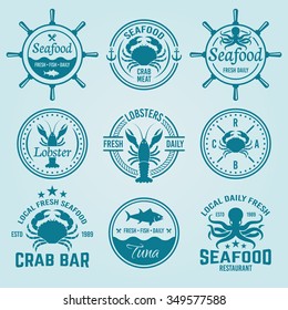 Seafood set of vector labels, badges, emblems and logos, seafood restaurant menu design elements