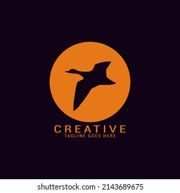 seagull logo design template flying in the sunset