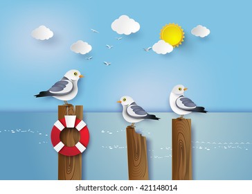 Seagull standing on a wooden post beside the seaside.paper art style.