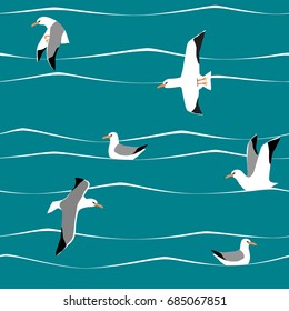 Seagulls on waves seamless pattern