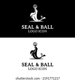 Seal beach playing ball using its nose for circus show white and black logo design idea