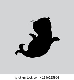 seal or sea lion silhouette on gray background.