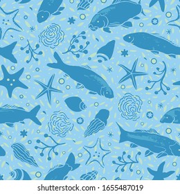 Sealife linocut style pattern with fish, starfish, seaweed and wavein blue tones on textured background. Summer beach pattern. Surface pattern design.