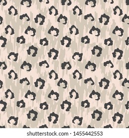 Seamles faux leopard skin pattern with hand drawn dark spots. Vector illustration animal repeat surface 