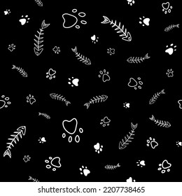 Seamles vector pattern with monochrome paw prints and fish skeleton, cats and dogs. Pet theme background. White and black background iversion