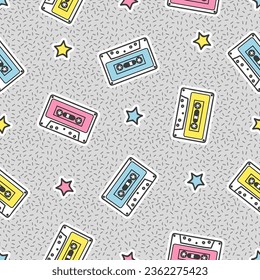 Seamless 90s pattern with audiocassettes. Trendy print with cartoon audio tapes