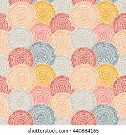 Seamless abstract background with colorful patterned circles on navy  blue background. Tribal pattern mandalas. Vector illustration.
