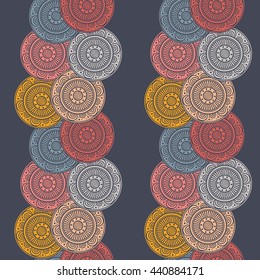 Seamless abstract background with colorful patterned circles on navy blue  background. Tribal pattern mandalas. Vector illustration.