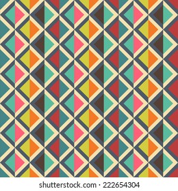 Seamless Abstract Background with colorful repeating triangles in retro colors