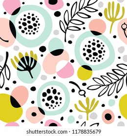 Seamless abstract background with flowers and leaves.
