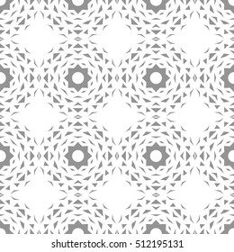 Seamless abstract background with geometric shapes. Triangles and snowflakes on a white background. Monochrome image.