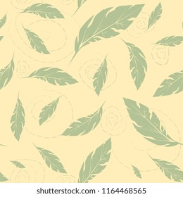seamless abstract background with green  leaves on a yellow background.Bright color background for  cards, paper wrapper and other objects.
