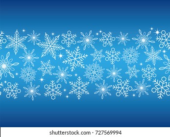 A seamless abstract blue winter background with white snowflakes, vector illustration.