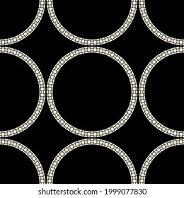 Seamless abstract circles pattern on a black background. EPS10 Illustration.