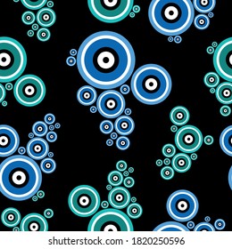 Seamless abstract circular pattern on black background.Vector design for fashion prints and backgrounds. EPS10 Illustration.