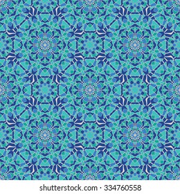 Seamless, abstract, colorful pattern. Template for stained glass, tiles, mosaics, carpets, shawls. Oriental bright ornament in blue tones.