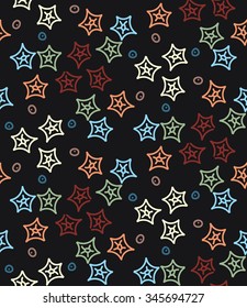 Seamless abstract colorful pattern. Vector illustration with hand drawn doodle stars, circles and dots of different colors on black background.