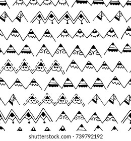 Seamless abstract decoration. Zigzags geometric design. Black and white hand drawn triangle shapes.