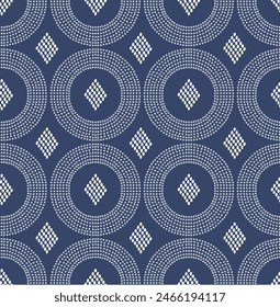 Seamless abstract dotted circle and diamond pattern. Ethnic vector geo repeat in indigo shade great for stationery, homeware, wallpaper, rug, apparel, gifts, prints, backgrounds, textiles.