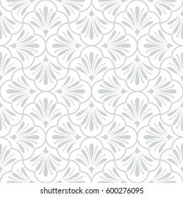 Seamless abstract floral pattern. Modern vector graphic. Grey and white background. Geometric leaf ornament