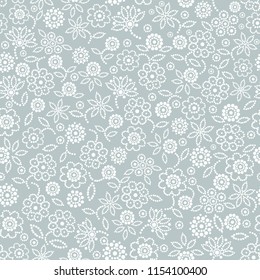 Seamless abstract floral pattern on blue background