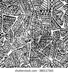 Seamless abstract geometric background. Handmade. Black and white vector illustration in grunge style. Restored vintage shabby background. Ethnic and tribal motifs.