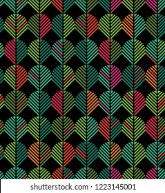 Seamless abstract geometric leaf pattern in Christmas colors. For backgrounds, gift wrap, fabric, scrapbooks.