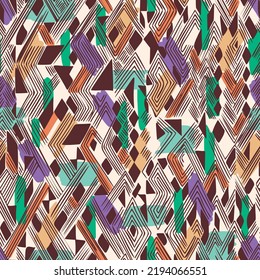 Seamless abstract geometric pattern. Artistic chevron background. Ethnic African folk ornament. Rhombuses, triangles, concentric zig zag lines. Simple hand drawn geometric shapes.