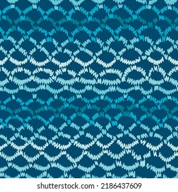 Seamless abstract geometric pattern with color decorative hand drawn circles, ovals forming grid. Chain background. Simple ethnic folk style. Knitting lace texture.