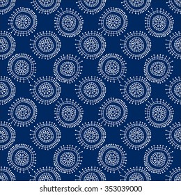 Seamless abstract geometric pattern in doodle style. White snowflakes on blue background, hand drawn, vector. For background design and decoration, wallpaper, packaging, fabrics, textiles.