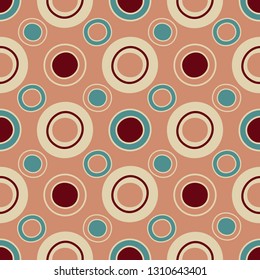 Seamless abstract geometric pattern with the image of rings and circles.
