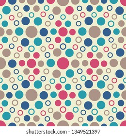Seamless abstract geometric pattern with the image of multicolored circles.
