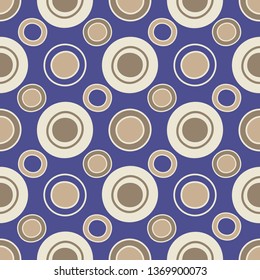 Seamless abstract geometric pattern with the image of rings and circles.
