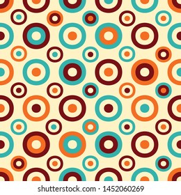 Seamless abstract geometric pattern with the image of rings and circles.
