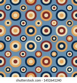 Seamless abstract geometric pattern with the image of rings and circles.
