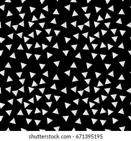 Seamless abstract geometric pattern resembling flowers on black background. Gradient grey and white triangles pattern. EPS10 vector illustration. For fashion design, paper gift, poster etc.