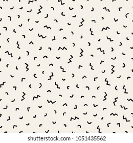 Seamless abstract geometric pattern in retro memphis style. Scatteres shapes vector trendy background.