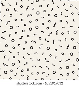 Seamless abstract geometric pattern in retro memphis style. Scatteres shapes vector trendy background.