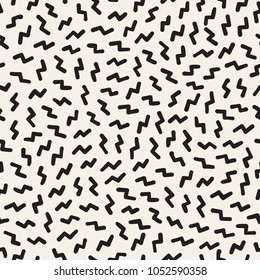 Seamless abstract geometric pattern in retro memphis style. Scatteres shapes vector trendy background.