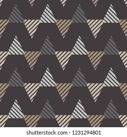Seamless abstract geometric pattern. Striped triangles. Vector pattern. Mosaic texture. Can be used for wallpaper, textile, invitation card, wrapping, web page background.