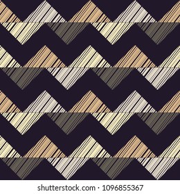 Seamless abstract geometric pattern. The texture of the triangles. Brushwork. Hand hatching. Scribble texture. Textile rapport.