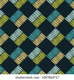 Seamless abstract geometric pattern. The texture of rhombus. Knitted texture. Brushwork. Hand hatching. Scribble texture. Textile rapport.