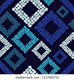 Seamless abstract geometric pattern. The texture of rhombus. The texture of the dots. Brushwork. Textile rapport.
