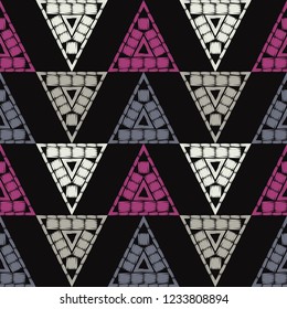 Seamless abstract geometric pattern. Triangles. Vector pattern. Mosaic texture. Can be used for wallpaper, textile, invitation card, wrapping, web page background.