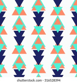 Seamless abstract geometric triangle background pattern in vector.Fashion wallpaper.Tribal print .