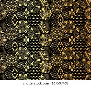 Seamless abstract geometric vector pattern of hexagons. Black and gold.