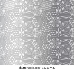 Seamless abstract geometric vector pattern of hexagons. Silver.