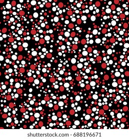 Seamless abstract geometrical pattern with motley elliptical spots. Red and white on black background.