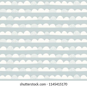 Seamless abstract hand drawn pattern. Arcs, scallops, semi circle doodle geometric background in mint and white.