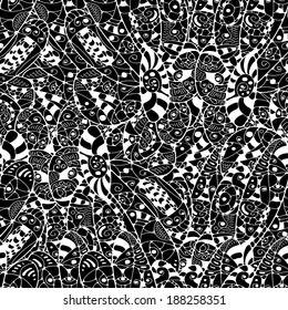 Seamless abstract hand-drawn  leaves pattern. Black and white.